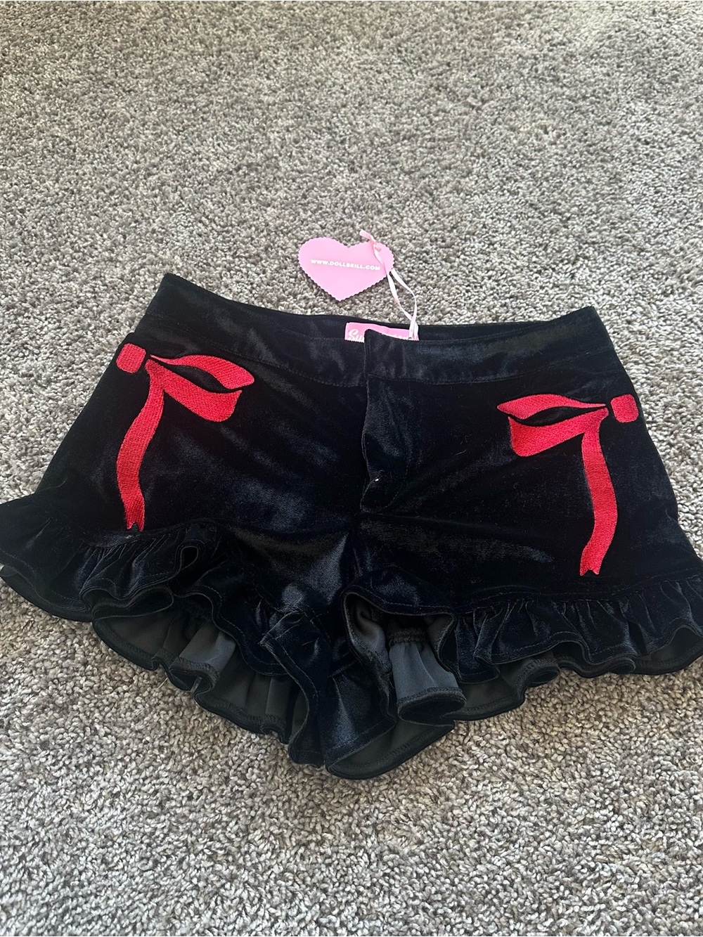 Sugar Thrillz Black Velvet Ruffle Shorts with Red Bow Accents